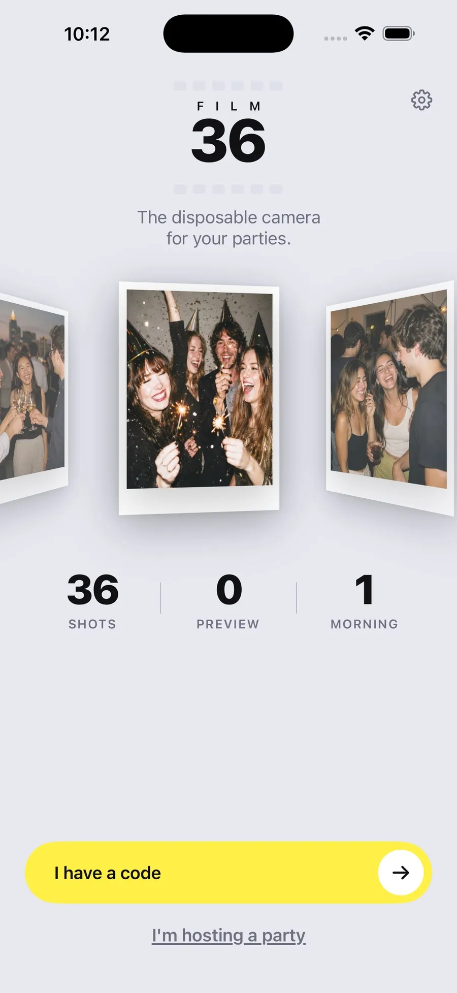 The Film 36 home screen with the logotype, a rotating carousel of prints and the counters reading 36 shots, 0 preview, 1 morning, above the I have a code button