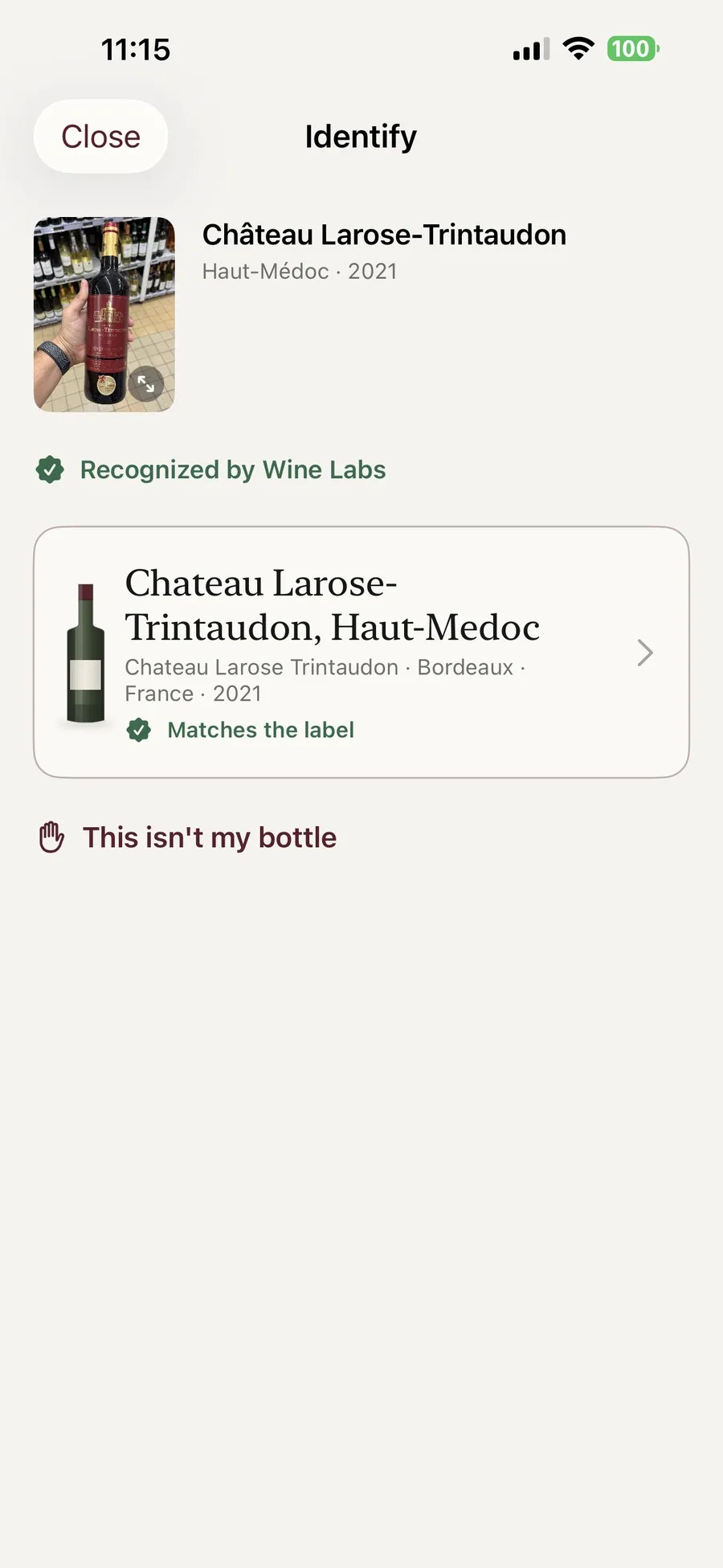 The Kav identify screen showing a photograph of a Haut-Medoc label, the note that Wine Labs recognised it, and the matching entry offered for confirmation