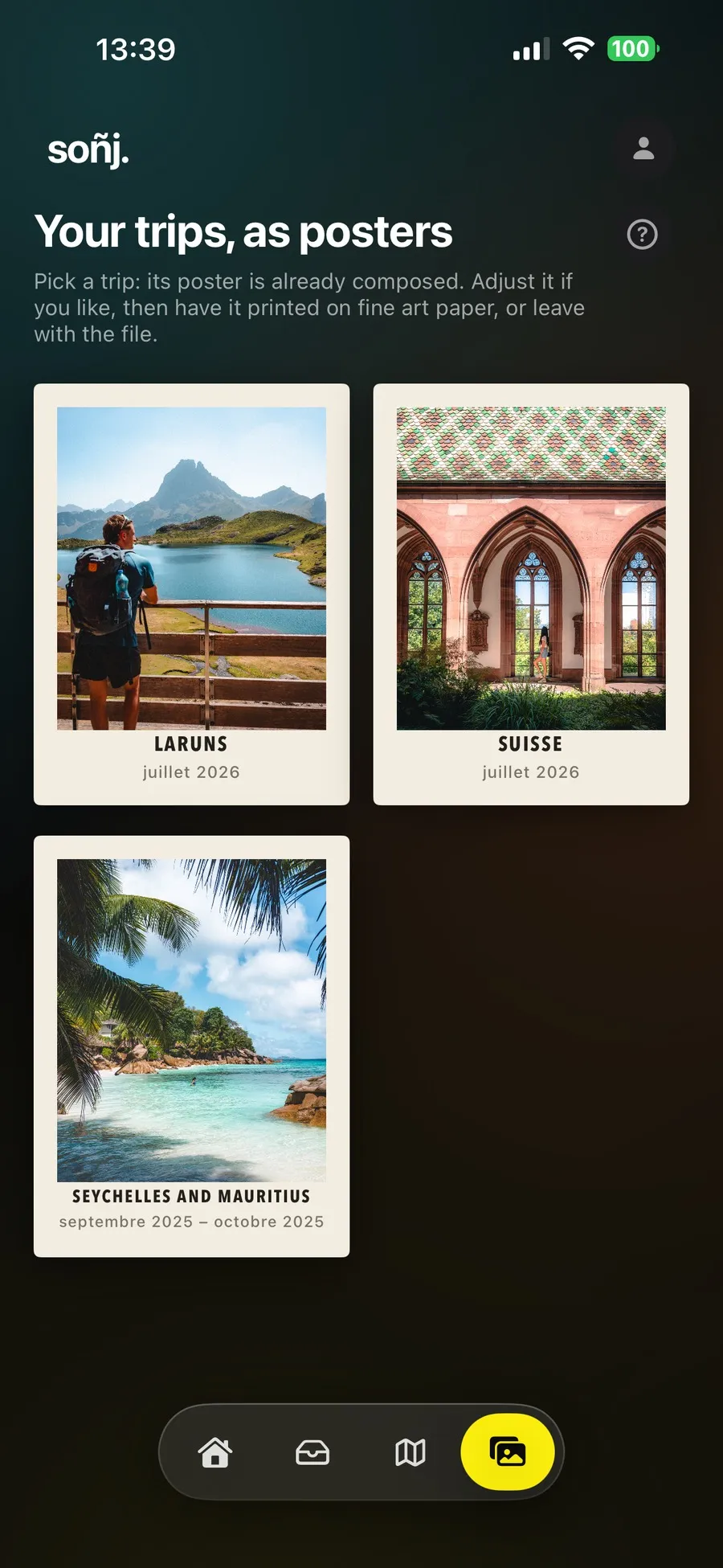The Soñj poster studio with three trips already composed as posters, Laruns, Switzerland, Seychelles and Mauritius, on cream paper